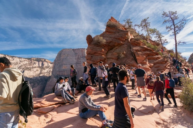 hikers gather on rocky trail