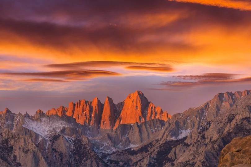 mountain range at colorful sunset