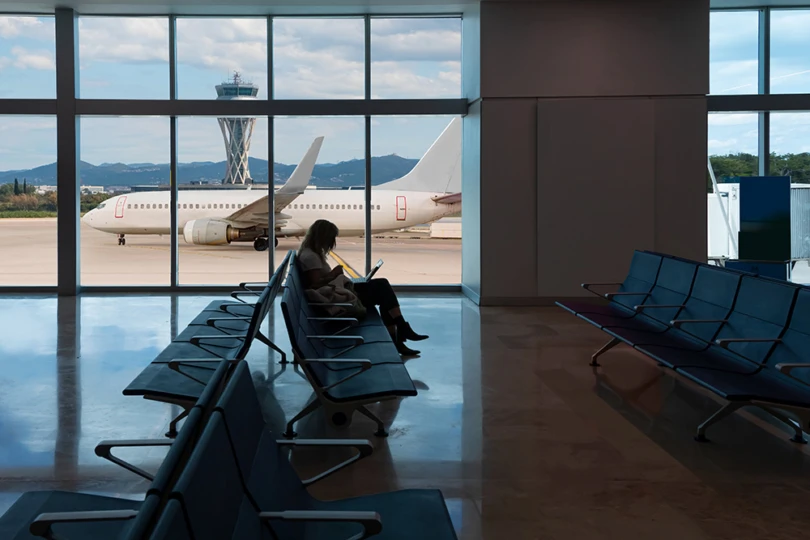 Silhouette,Of,Young,Woman,Working,On,Laptop,And,Waiting,For