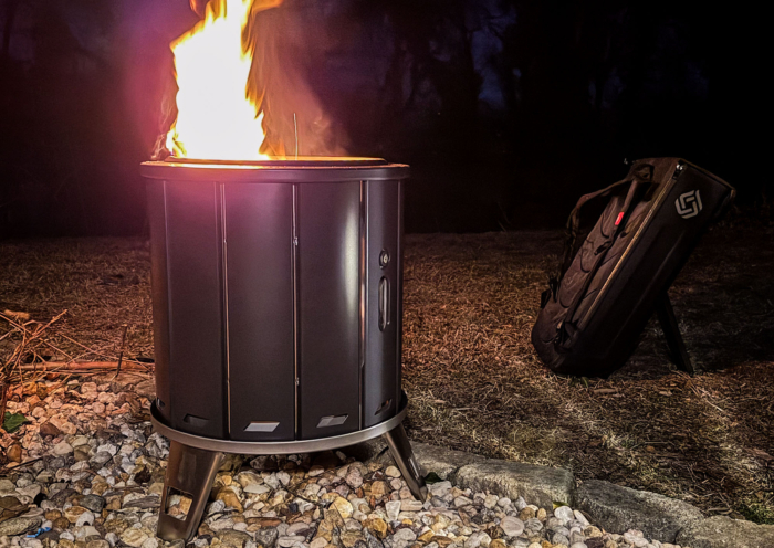 packfire fire pit at night with carrying case