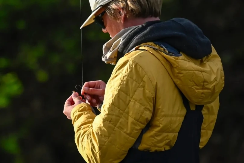 Dylan Nut tying on a bait.