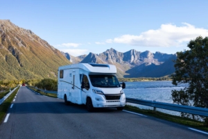 White,Camper,Van,Parked,On,The,Side,Of,A,Road