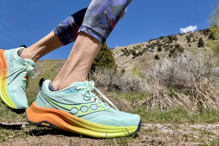 Woman running in Saucony Peregrine 16 Trail Running Shoe close up