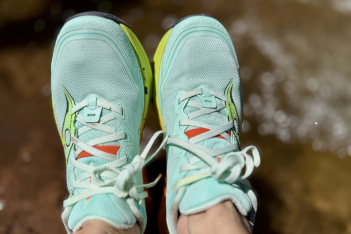 Close up of Saucony Peregrine 16 Trail Running Shoe next to creek