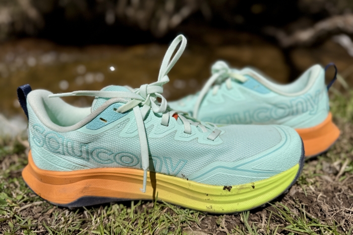 Close up of Saucony Peregrine 16 Trail Running Shoe next to creek