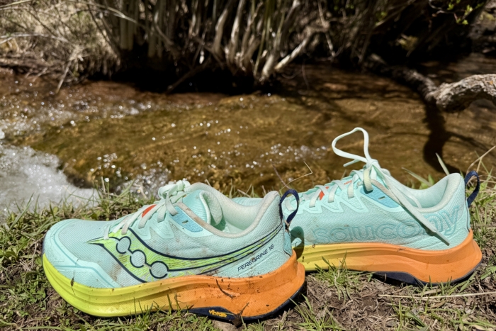 Close up of Saucony Peregrine 16 Trail Running Shoe next to creek
