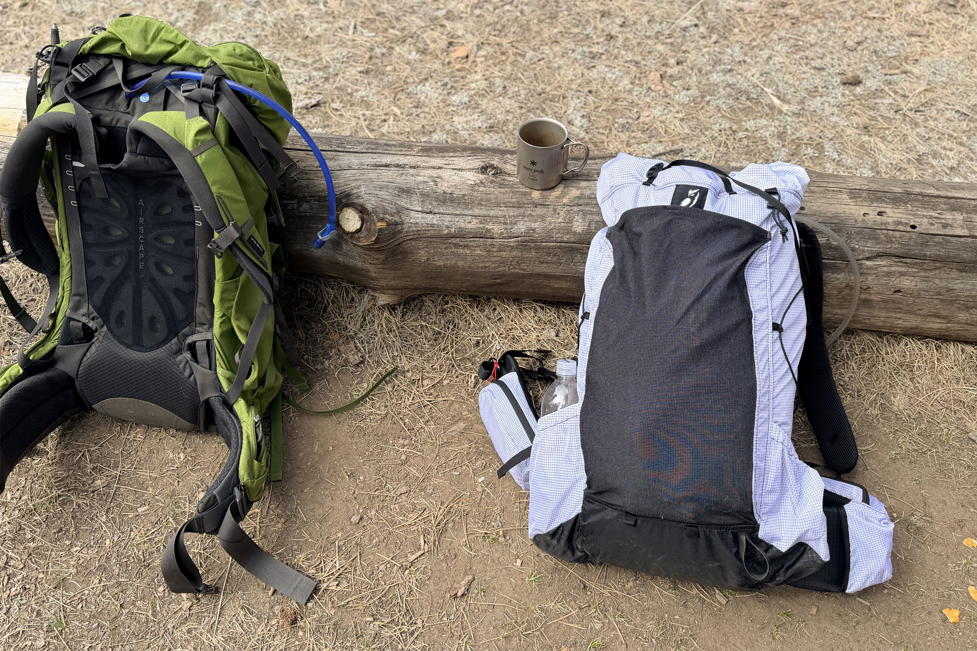 Outdoor Vitals Carbon Evo 50 Backpack next to another backpack