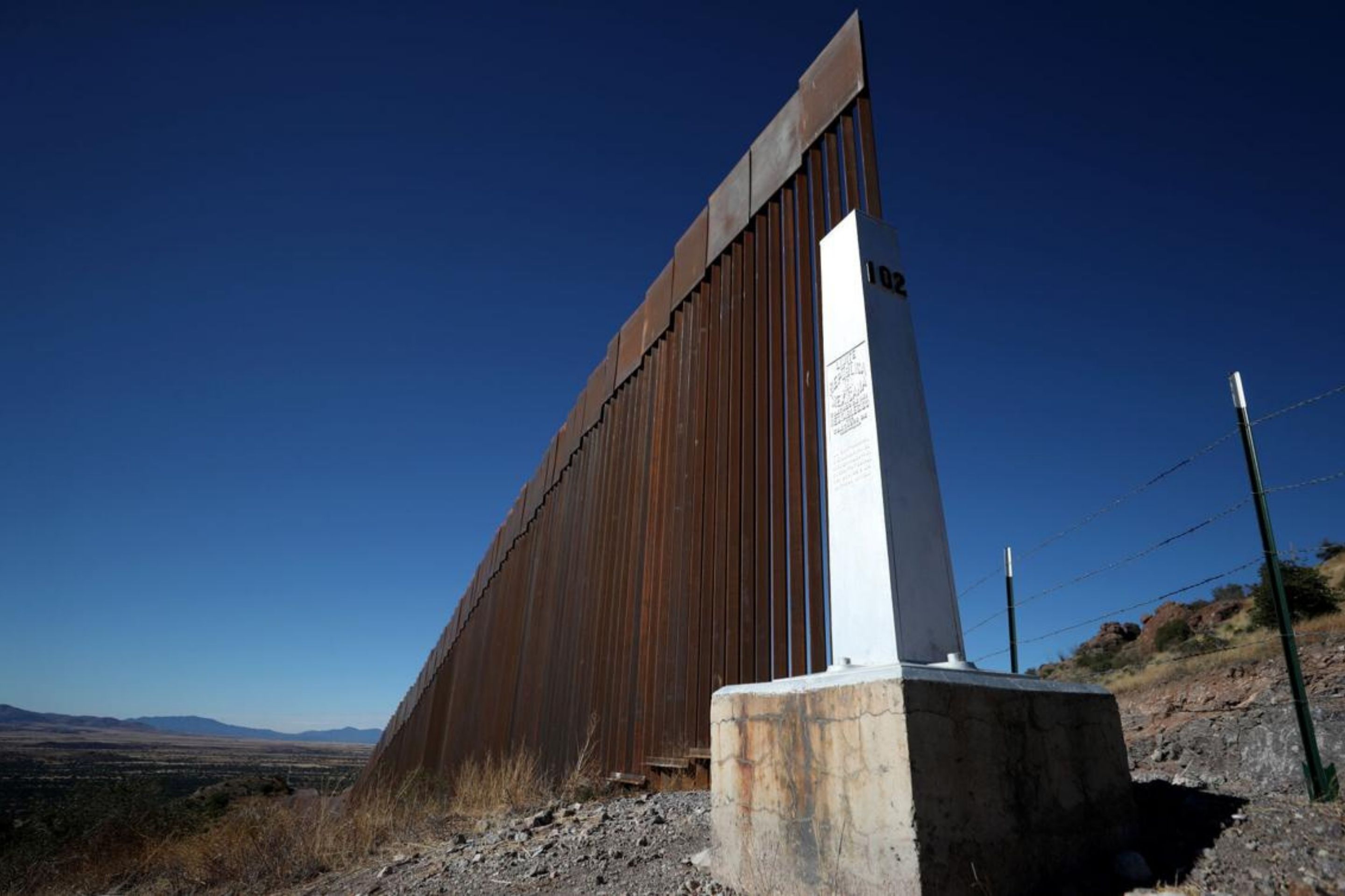 border wall in front of obelisk