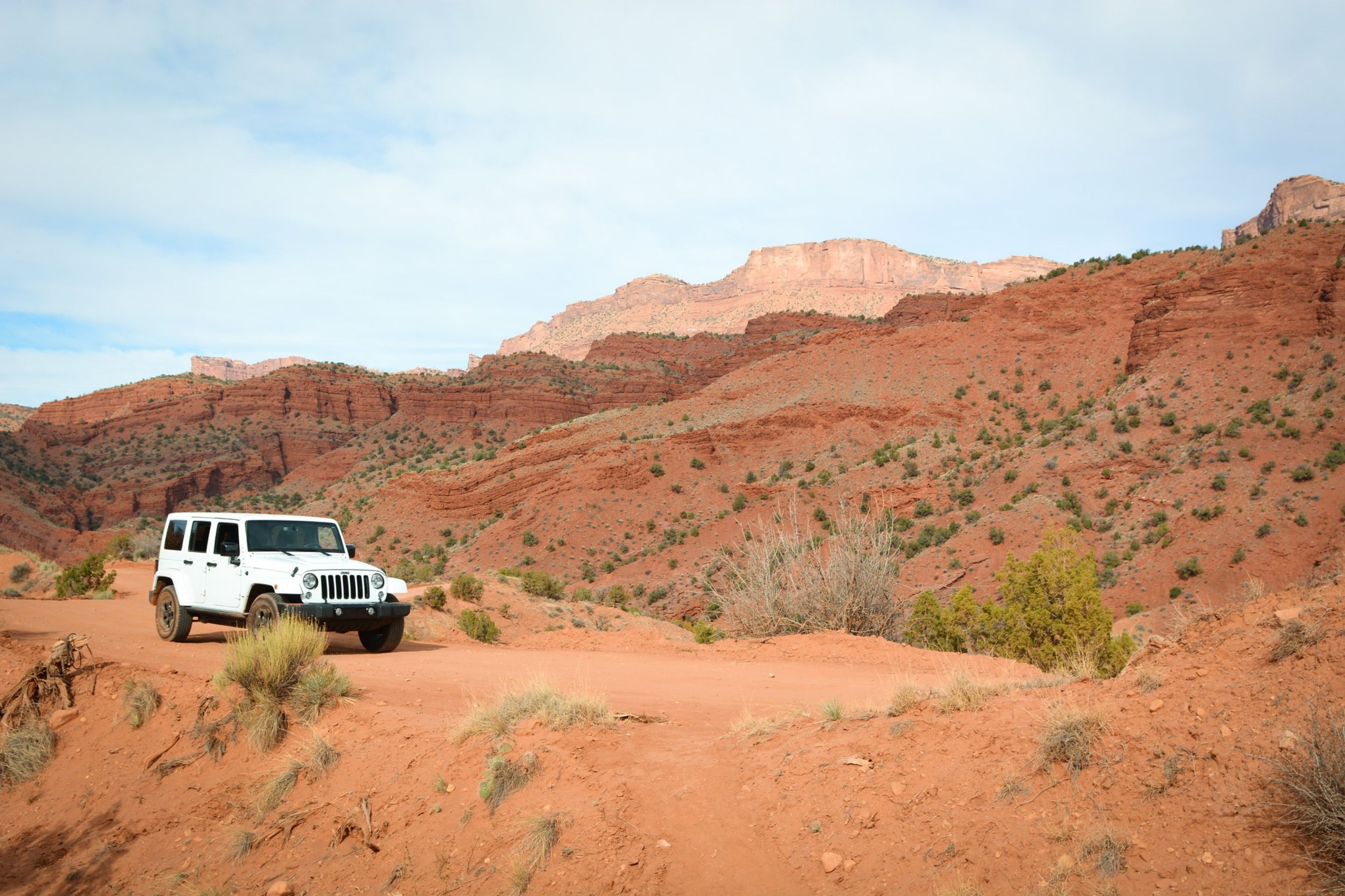 jeep on sandy bluff