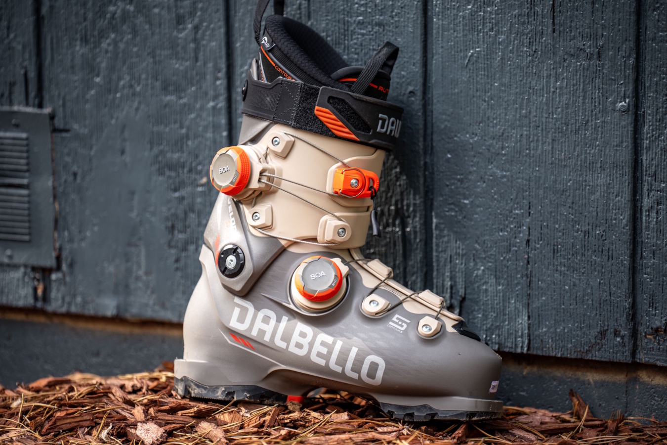 Skier tightening BOA dial on Dalbello Veloce Space ski boot
