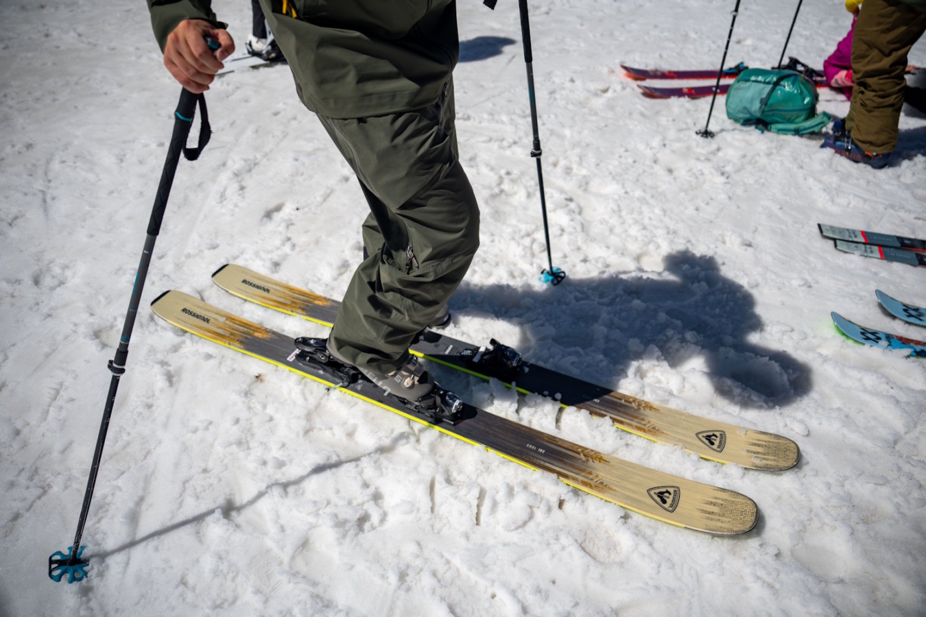 A skier wearing Dalbello boots standing on Rossignol Soul 102 skis