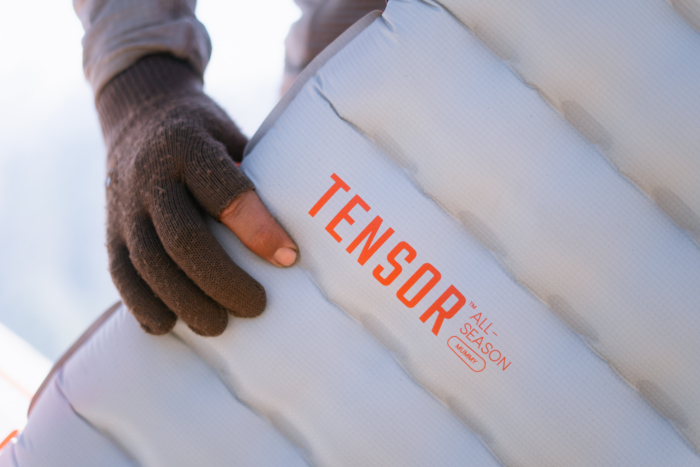 Tensor All-Season sleeping pad with the product name printed on the fabric