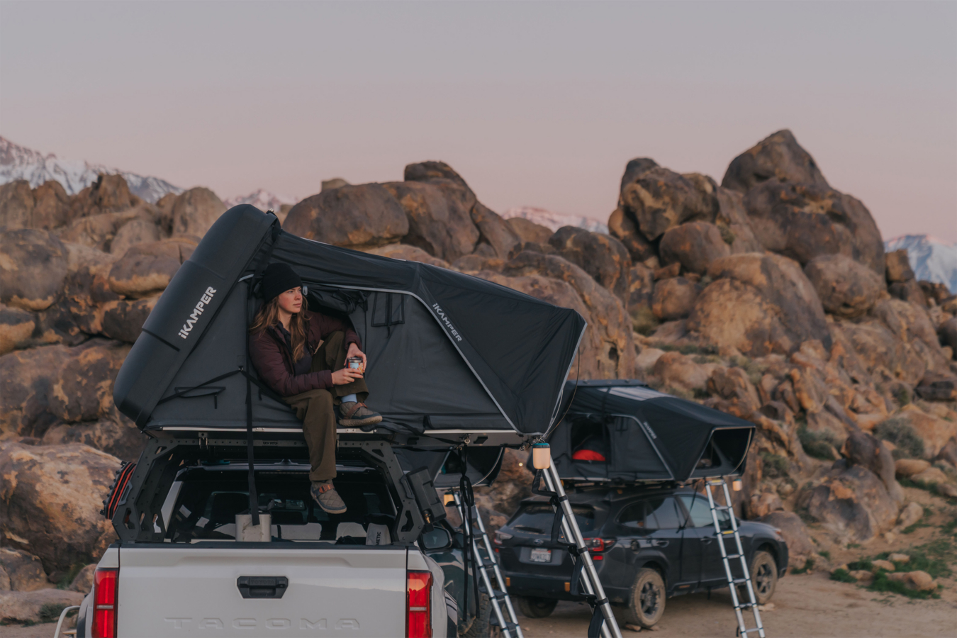 Woman sits in iKamper Skycamp 4