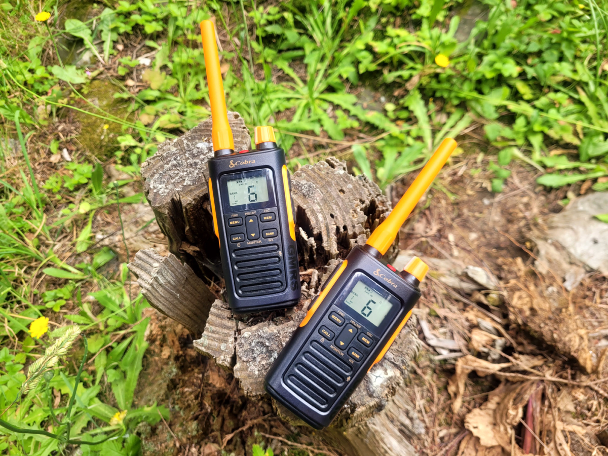 two cobra trailblazer 450 gmrs radios on a stump in washington state during testing