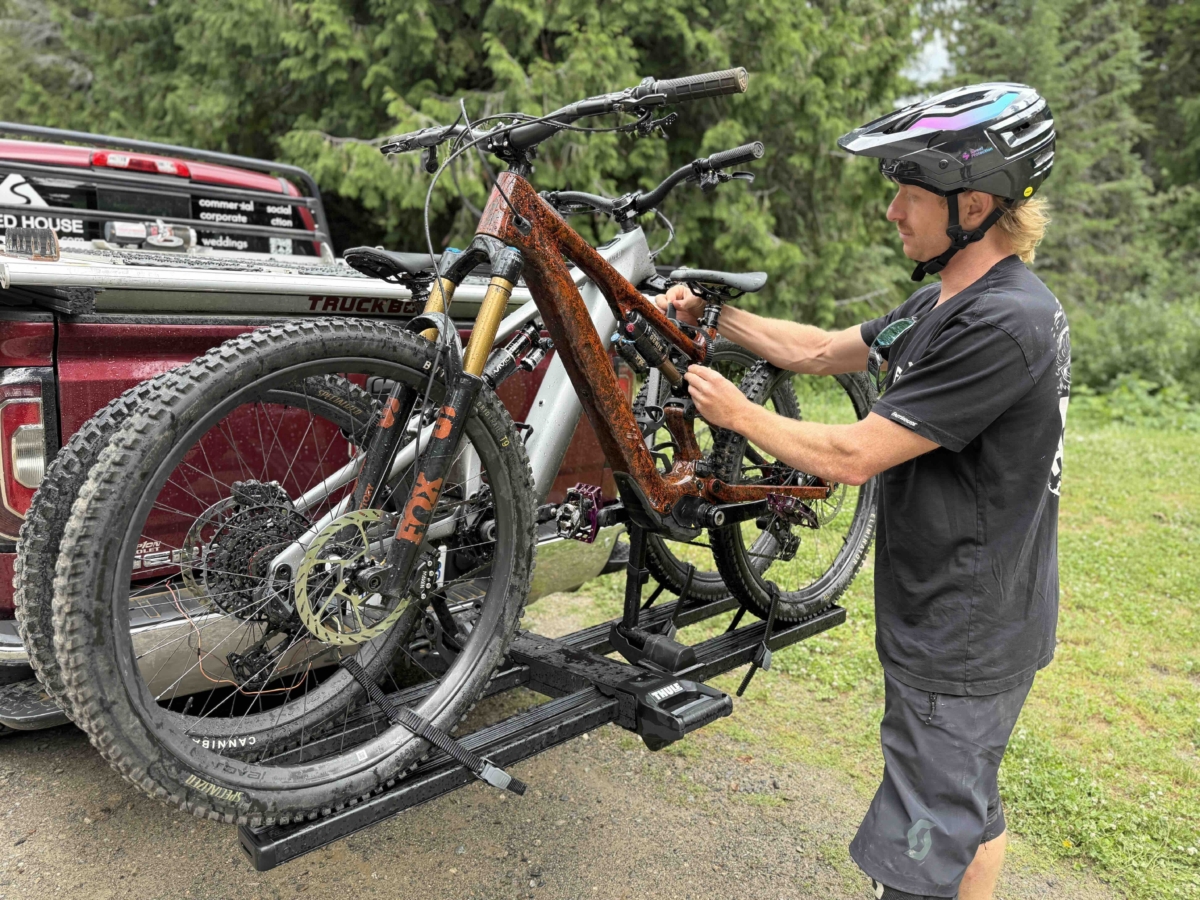 Loading two e-MTBS onto the Thule Vero hitch bike rack; (photo/Morgan Tilton)
