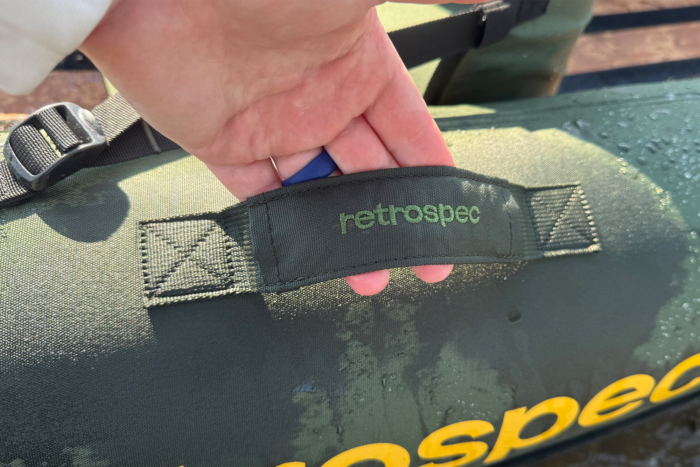 Close-up of the Retrospec carry handle on the side of the kayak