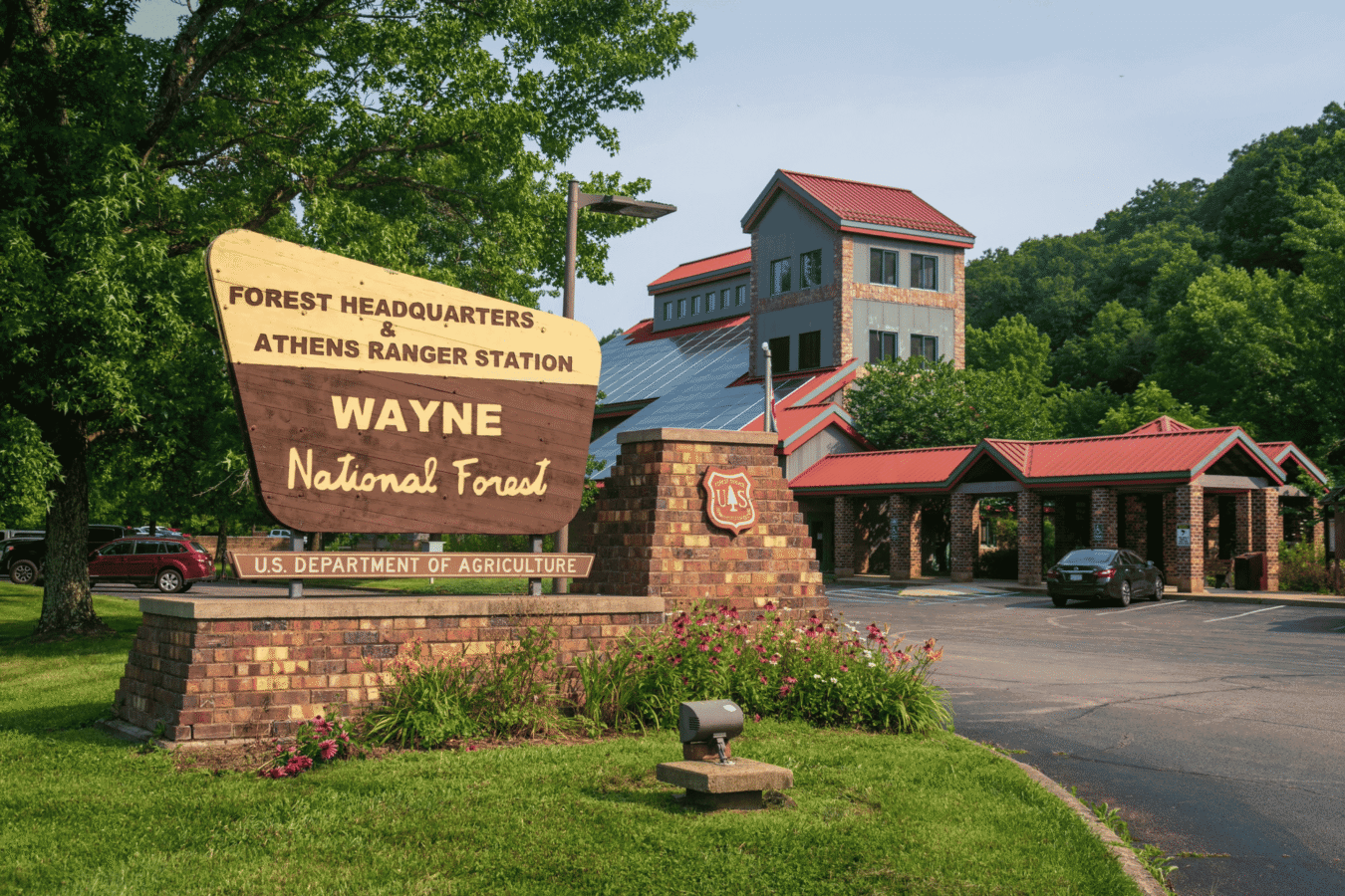 building with forest service sign