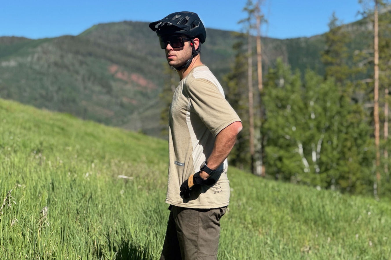 a cyclist wearing the ortovox sequence kit