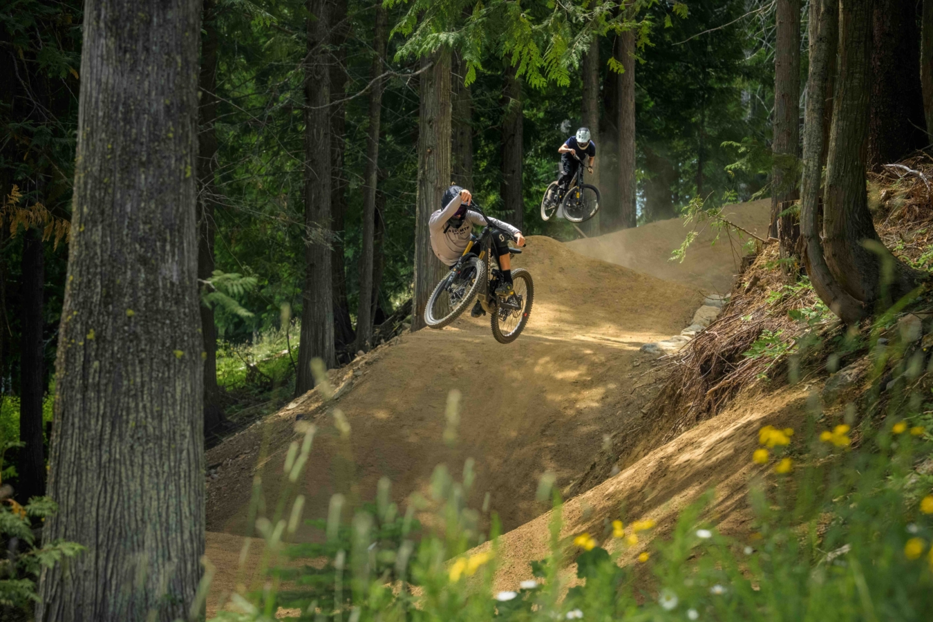 Athletes Dane Tudor and Max Nutini riding upper Obsidius at RED Bike Park; (photo/Ashley Voykin)