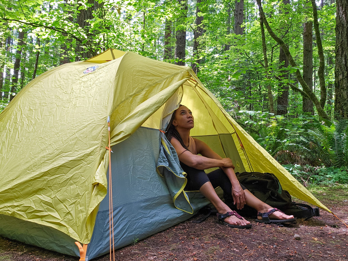 the author sitting in the big agnes blacktail 2 tent during testing