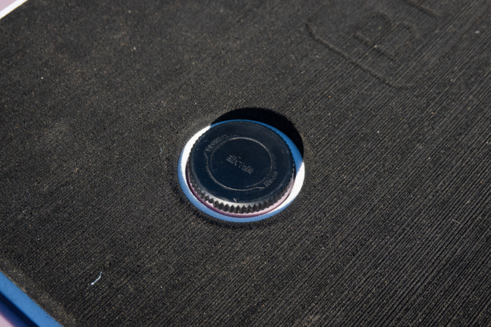 Close-up of the built-in bottle opener on the cooler lid