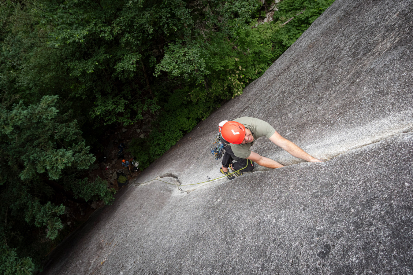 Climber using a Mammut Crag Recycled rope on a steep granite route