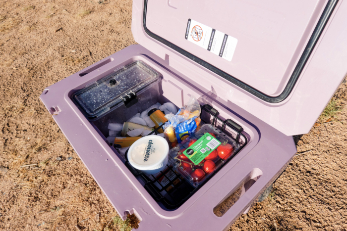 BrüTank 55-quart cooler packed with ice, drinks, and food