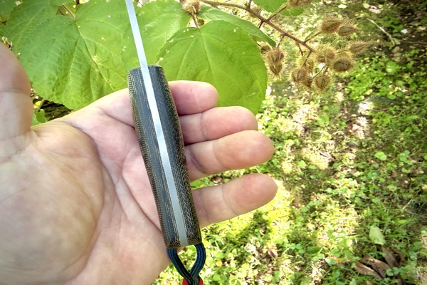 a man holding Reiff Knives F3