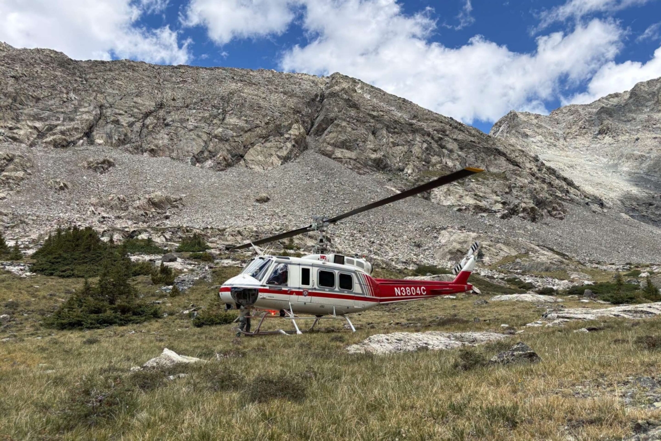 helicopter stationary on mountain