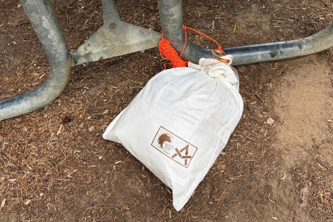 bear bag tied to picnic bench