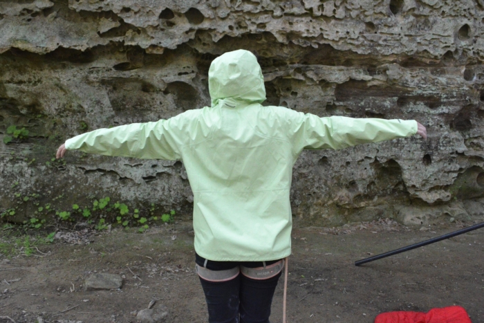 rear view of person standing in jacket