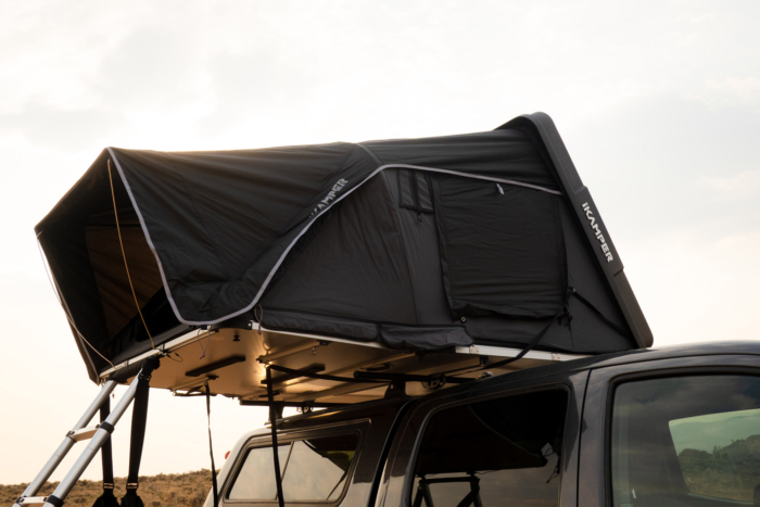 Open Skycamp 4.0 Trio camper mounted on a pickup truck