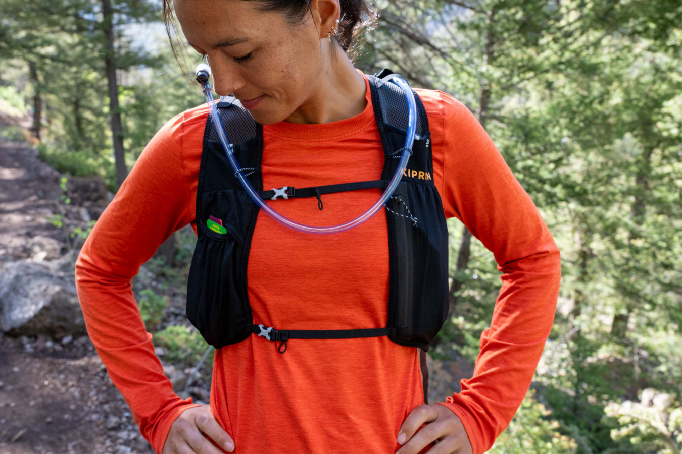 a woman wearing the kiprun 5l running vest