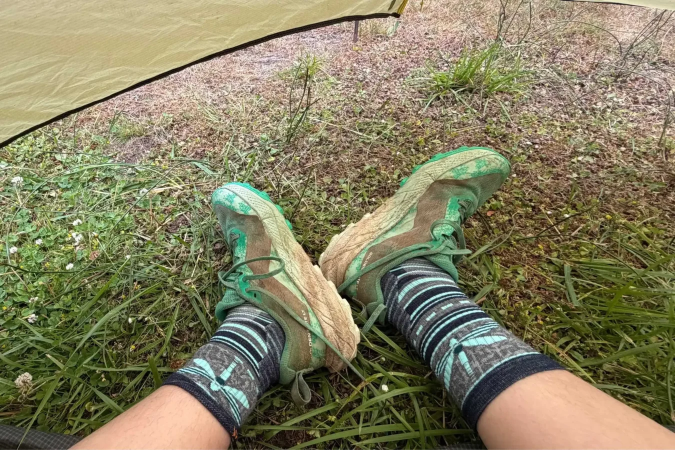 a woman wearing scarpa shoes