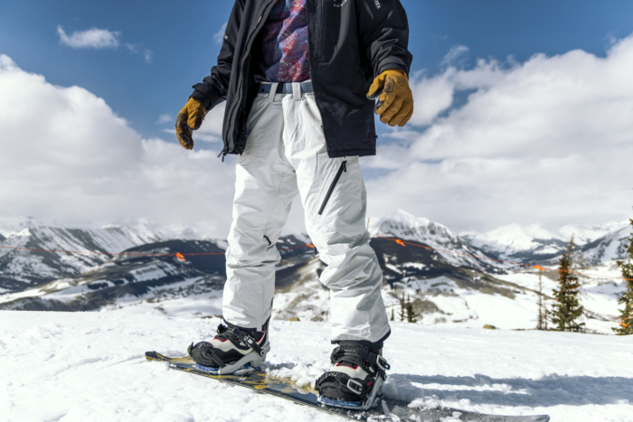 snowboarder standing strapped into board