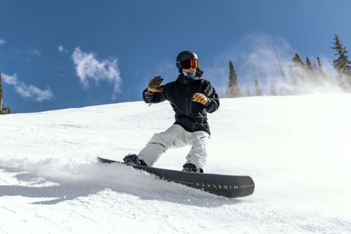 snowboarder making heelside carve