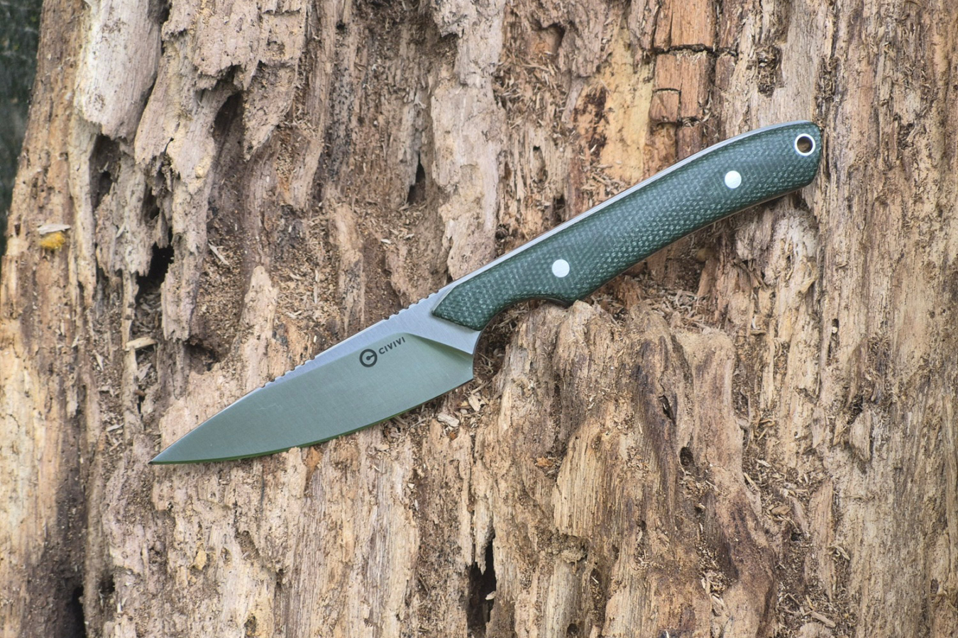 CIVIVI High Grass knife resting on weathered wood