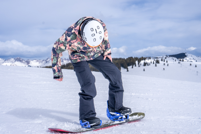 rider clicking into Step On Lexa X EST snowboard binding