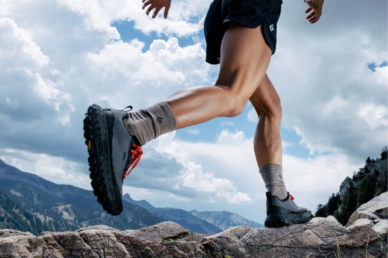 close-up shot of person running in mountain