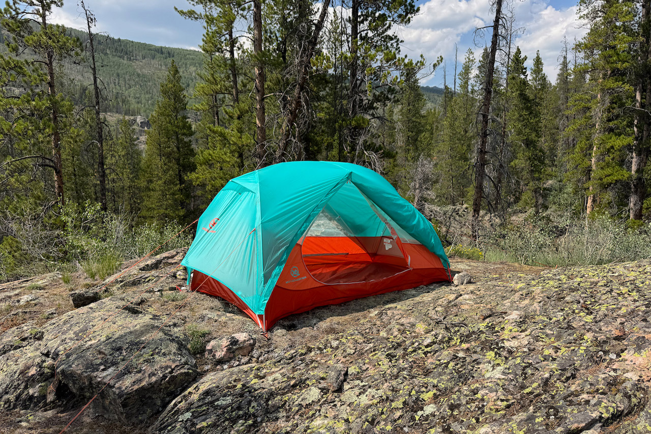 Horizon Lite 2 Pro tent with the vestibule open at a rocky forest campsite