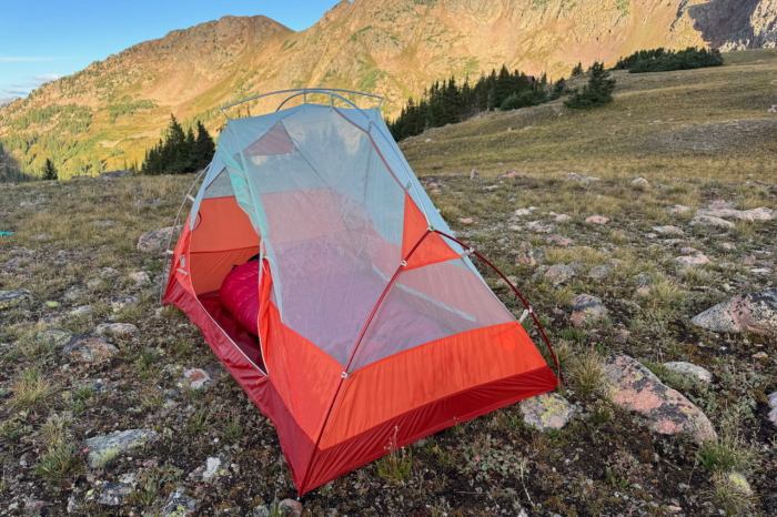 Windquester tent without the rainfly showing the mesh body and sleeping setup