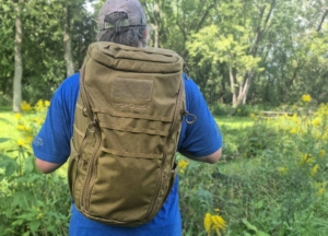 man wearing Switchblade Eberlestock pack