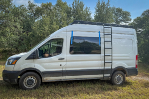 Large side window installed during a DIY campervan conversion