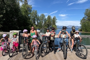 group of people and kids on bikes