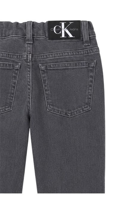 Jeans unisex grigio in cotone CALVIN KLEIN | IB0IB01783/DEBGRIGIO
