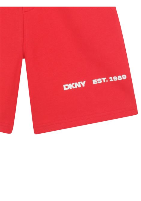 Red cotton Bermuda shorts for children DKNY | D62242/SUROSSO