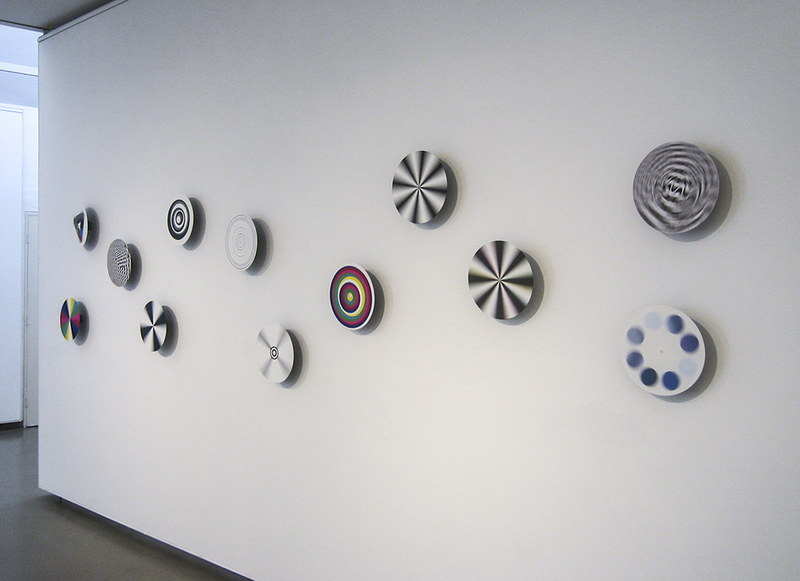 LUKE PARKER Test pattern tests, 2006 acrylic on vinyl records, electric motors, dimensions variable