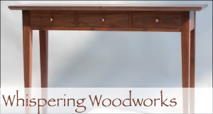 Whispering Woodworks Fine Custom Furniture and Reproductions logo