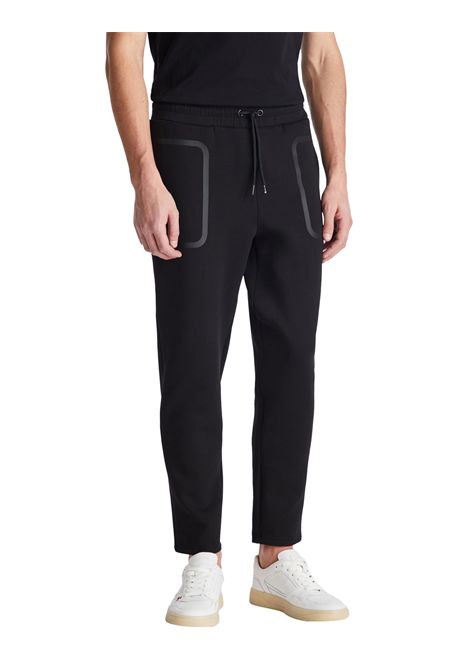 Joggers with pockets with rubberised taping PEUTEREY | Trousers | PEU5800NER