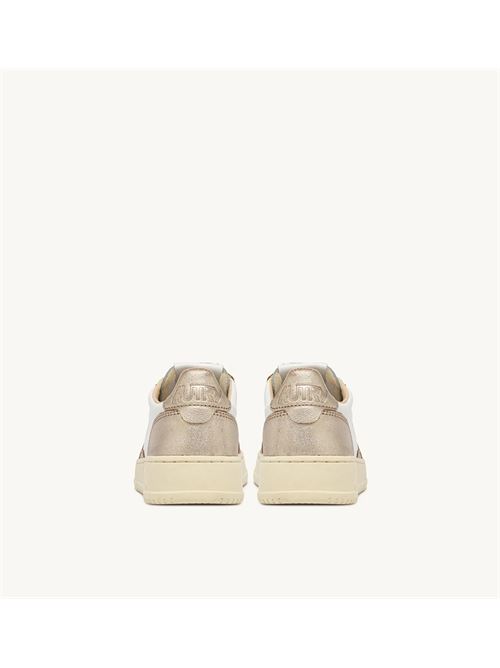sneakers medalist low bicolor in pelle bianca e metallizzata oro Autry | AULW WB16WB16